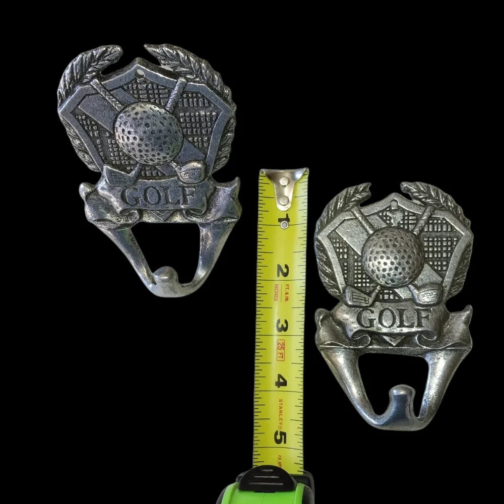 Pair of Golf emblem wall hangars.